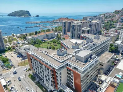 an aerial view of a city with the ocean at Condo Studio Plaza in Budva