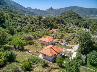 an aerial view of a house with a roof at Two Bedroom House with Sea View MAJ in Ðurovići