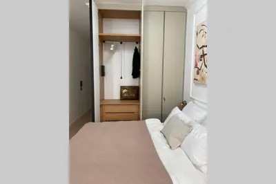 a bedroom with a bed and a closet at A21 LUX - Soho City Complex in Bar