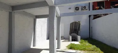 an outside view of a building with concrete pillars at Downtown apartment in Cetinje