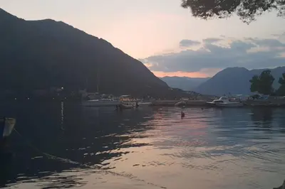 a view of a body of water with boats in it at Garden Apartment- near sea 2 in Dobrota