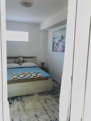 a bedroom with a bed in a room at Oldmill Apartment in Ulcinj
