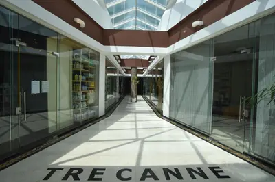 a tree campus building with a tree came sign on the floor at Apartment in the luxury hotel near beach in Budva