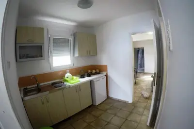 a kitchen with a sink and a counter top at Apartman Aleksandra in Ulcinj