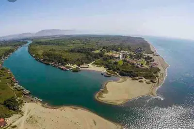 an aerial view of an island in the water at Rajana Bungalow - Ulcinj in Ulcinj