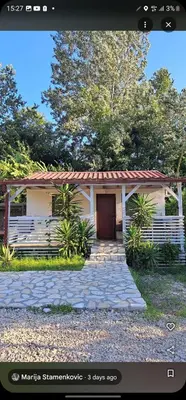 a small white house with a red roof at Rajana Bungalow - Ulcinj in Ulcinj