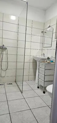 a bathroom with a shower and a sink at Rajana Bungalow - Ulcinj in Ulcinj