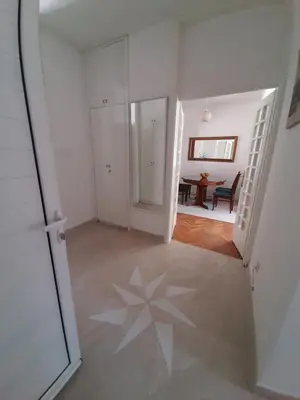 an empty hallway with a room with a dining room at Old Town Heart in Kotor
