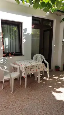 a table and two chairs sitting on a patio at Apartments Marina in Becici