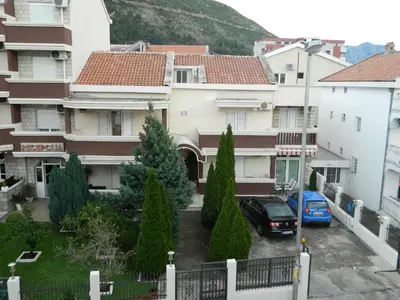 a view from the balcony of a apartment building at Mena apartmani in Budva