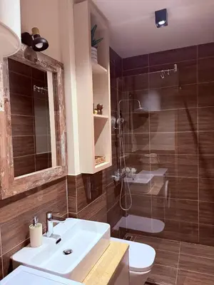 a bathroom with a sink and a toilet and a shower at Ada Bojana Beach House I XXL TerraceI BBQ I Betw BridgeBeach I Air Con in Ulcinj