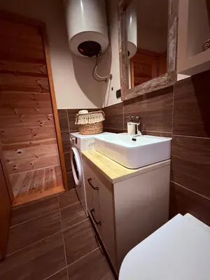 a small bathroom with a sink and a toilet at Ada Bojana Beach House I XXL TerraceI BBQ I Betw BridgeBeach I Air Con in Ulcinj
