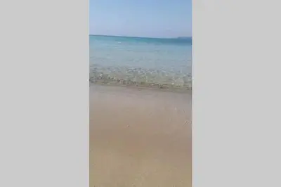 a view of the beach with the ocean in the background at Peaceful Sea Residence in Bigovo