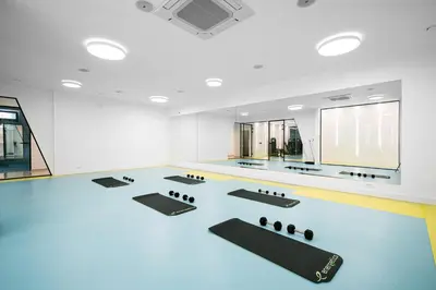a room with a dance floor with black mats at Status-M Apartments 179 in Becici