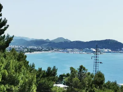 a view of a body of water with trees at Green Pino Seaview Studios in Bar