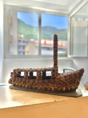 a chocolate train cake on top of a table at The Four Fish in Petrovac na Moru