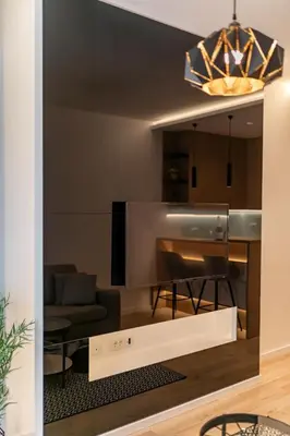 a view of a living room with a table and chairs at Soho City A403 in Bar