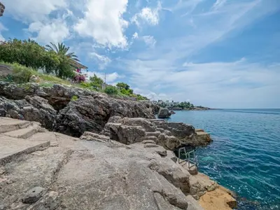 a view of the ocean from a rocky shore at Villa Yovan Seaview in Dobra Voda
