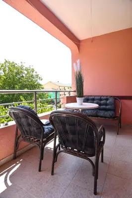 two chairs and a table on a balcony at Perfect Location close to Jaz beach - Apartments Rora Knezevic in Budva