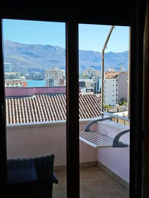 a view of a balcony with a view of a city at Villa Krivokapić Budva in Budva