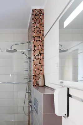 a bathroom with a shower with a glass door at Tophill Altezza Premium - best view and pool in Budva