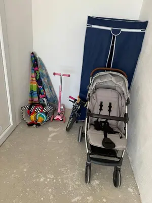 a stroller in a room with a tent and a bike at Tophill Altezza Premium - best view and pool in Budva