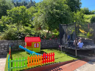 a childs play area with a toy playground at Apartment Lorena in Kotor
