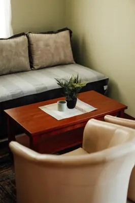 a coffee table with a couch in a living room at Villa Casa di Pietra - Budva Old town in Budva