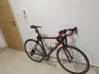 a bike parked against a wall in a room at Sunny Hill Suite Ljubovic in Podgorica
