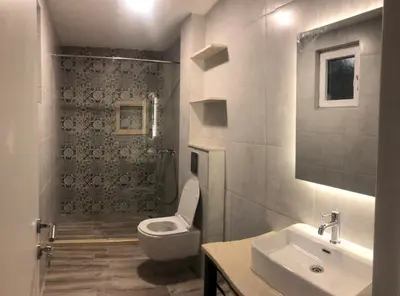 a bathroom with a toilet and a sink at Belami luxury apartments in Ulcinj
