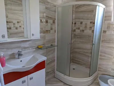 a bathroom with a shower and a sink at Apartments BEA in Ulcinj