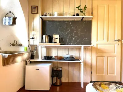 a small kitchen with a sink and a counter at HealthyStudio512 Apartments in Kotor