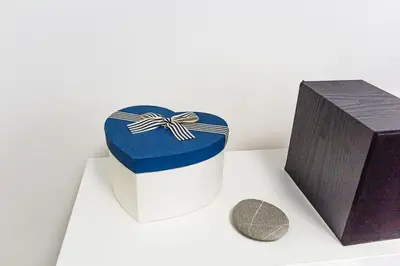 a blue and white box next to a black box at Miramare Apartments Pržno in Pržno