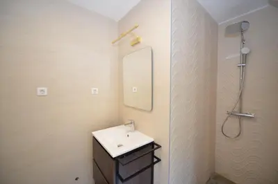 a bathroom with a sink and a mirror at SEASIDE HOUSE KOTOR in Kotor