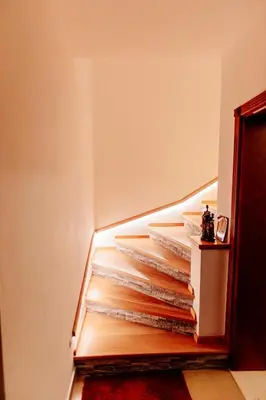a staircase in a room with a shelf at Etno Villa Mokanji in Danilovgrad