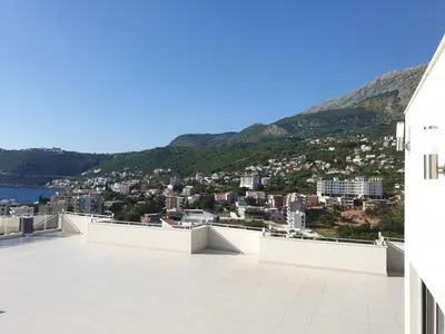 a view of the city from the roof of a building at Apart sunset in Bar