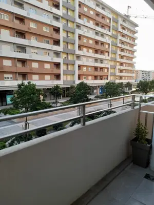 a balcony with a view of a building at Apartment Diamond in Podgorica