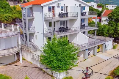 an overhead view of a white apartment building with balconies at VIVANA HOUSE in Bar, Susanj
