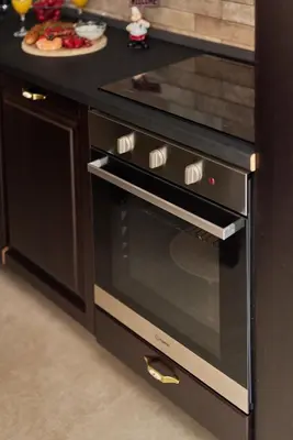 a black oven in a kitchen with a counter at Apartment Lav in the City Centre in Kotor