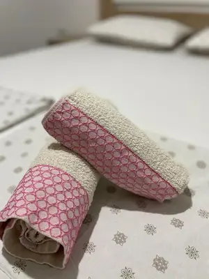 a pink towel on top of a computer keyboard at Villa Dafina in Donji Štoj