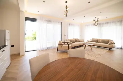 a living room with two couches and a table at B&B Lovac Hasa in Ulcinj