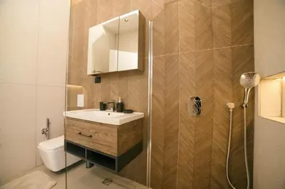 a bathroom with a toilet and a sink and a shower at B&B Lovac Hasa in Ulcinj