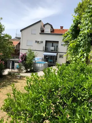 a view of a house from the garden at Vila Marina in Sutomore