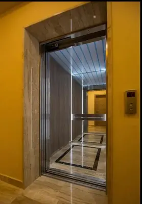 a reflection of a mirror in a hallway at Apartments Milica in Becici