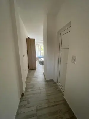 an empty hallway with a door in a room at Luna Apartments in Budva