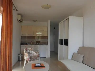 a living room with a couch and a table at Luna Apartments in Budva