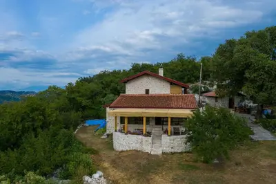 a small house on top of a hill at Royal Villa Ana in Cetinje
