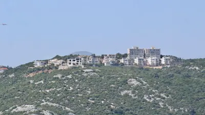a group of buildings on top of a hill at 1bd Sea View Apts Veliki Pjesak 