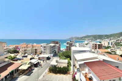 a view of a city with the ocean in the background at 1bd Sea View Apts Veliki Pjesak 