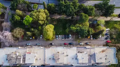 an overhead view of a parking lot with cars at Apartment Mona in Podgorica